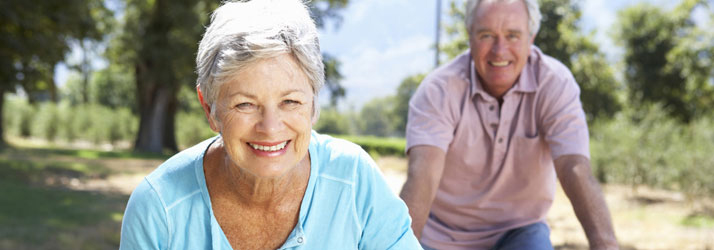 Chiropractic Wenatchee WA Couple Riding Bikes